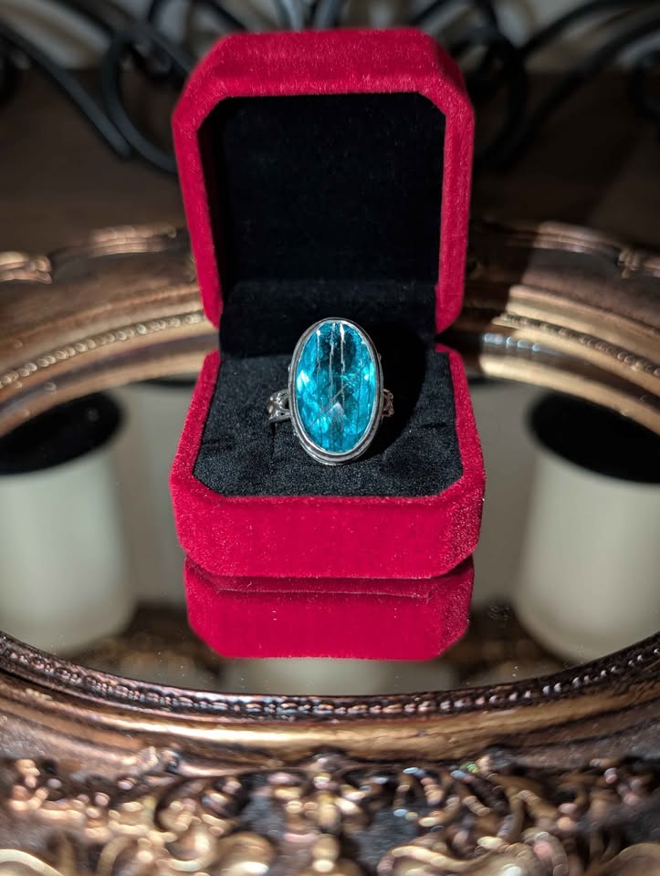 Sajen Rutilated Celestial Pariba Quartz Ring in a Red Velvet Box
