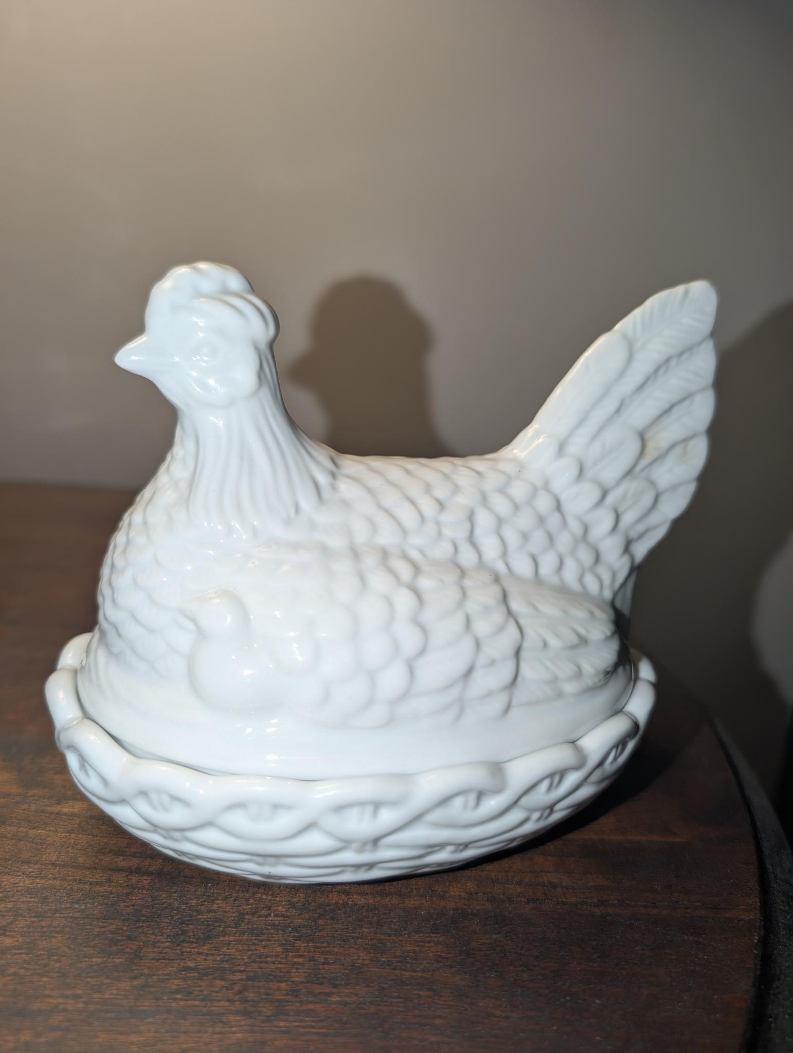 Vintage white hen on nest covered dish, oval basket-weave base
